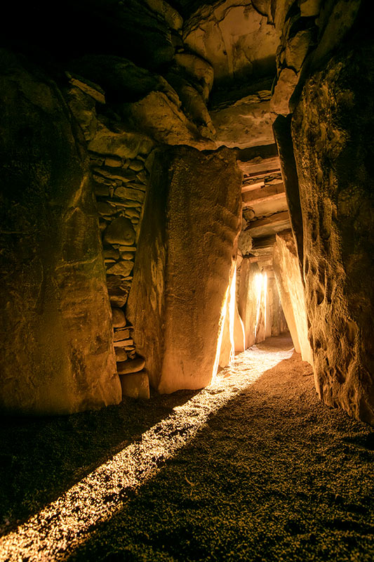 Winter Solstice First Light at Newgrange. Light enters the tomb at Newgrange one of the marvels of Neolithic Ireland for Newgrange Winter Solstice Podcast Series