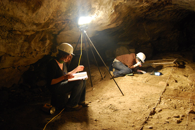 Dr Marion Dowd, author of the Archaeology of Caves in Ireland during an excavation (photo by Ken Williams)