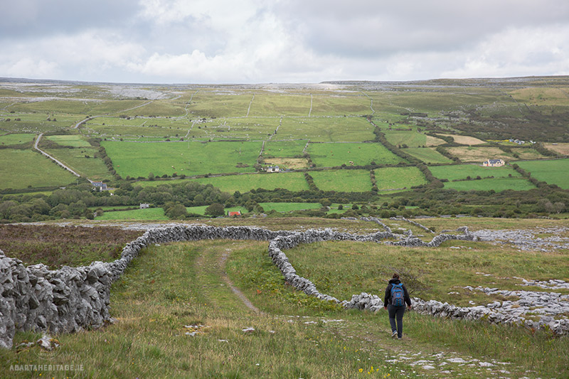 Roisin Burke of Abarta Heritage walking the Green Road in the Burren, one of our favourite places along the Wild Atlantic Way