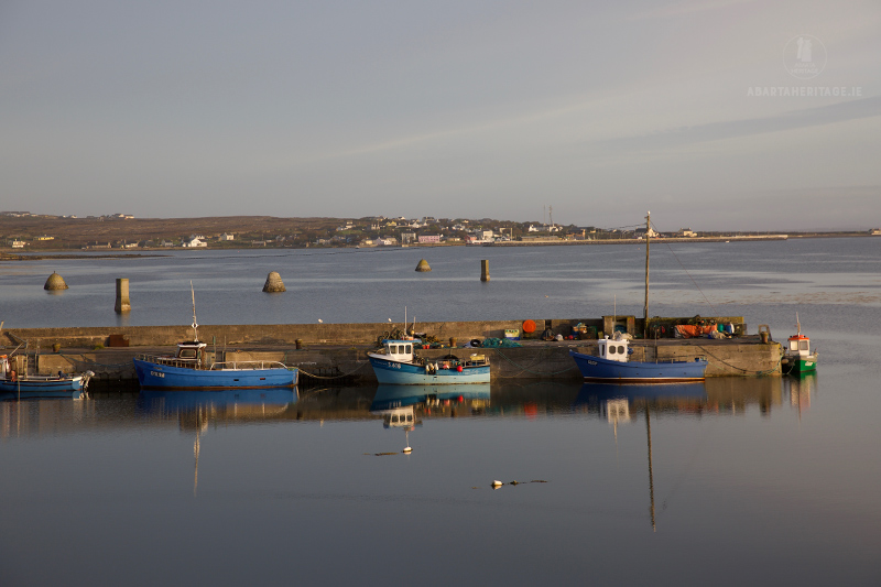 Fishing boats tied up on Inis Mór, a quiet scene for the Wild Atlantic Way